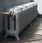 Rococo 3-koloms gietijzeren radiator, 47 cm. hoog